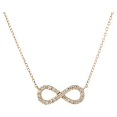Collana con ciondolo Infinity in oro giallo 14KT con diamanti