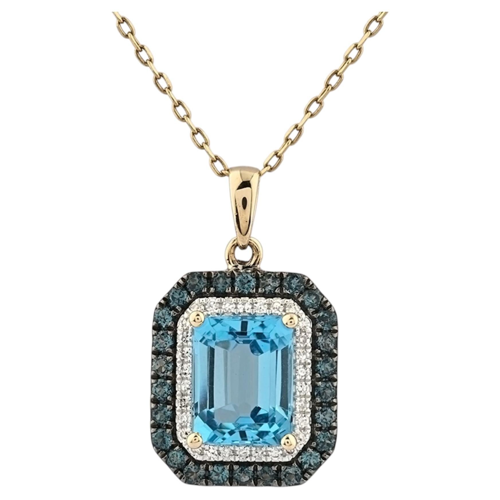 Collar con colgante de doble halo de oro amarillo de 14 quilates con topacio azul de corte esmeralda