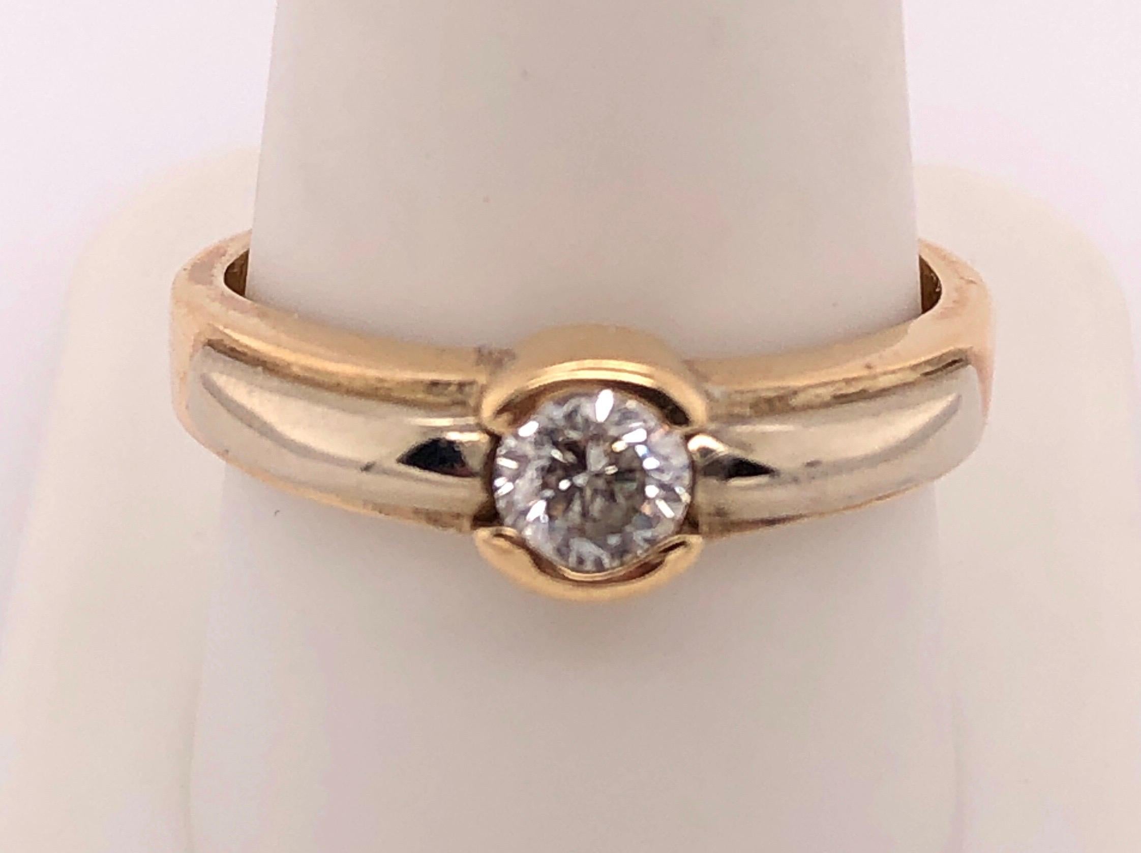 Bague de fiançailles ou de mariage en or jaune 14Kt
0,50 Poids total des diamants.
Taille 10 
Poids total : 5,75 grammes.
