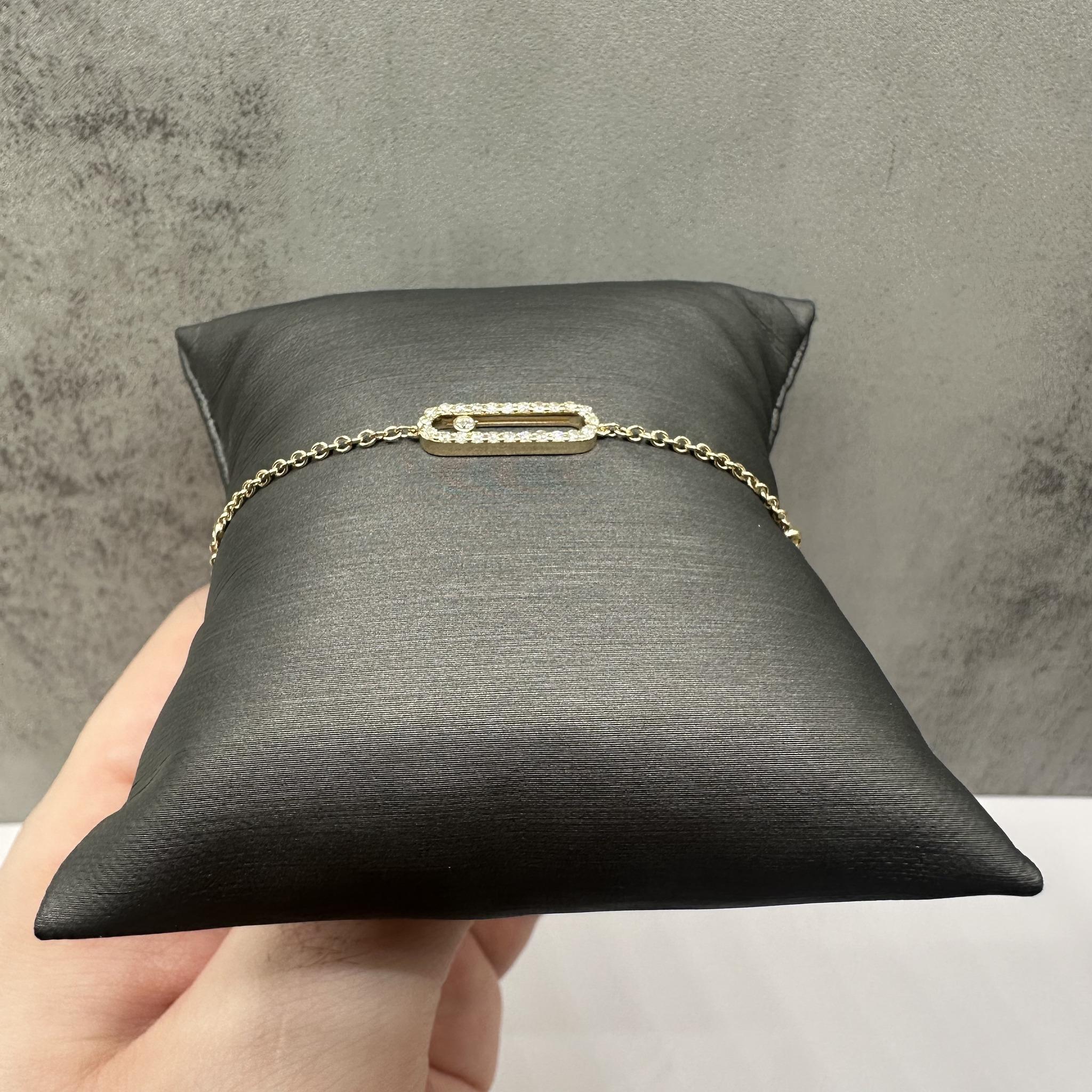 This elegant 14kt Yellow Gold Floating Style Diamond Bracelet features 0.30ctw of natural HI I1 round diamonds, providing a delicate and sparkling touch. With a 7-inch length, it fits comfortably on most wrists, and the lobster clasp ensures a