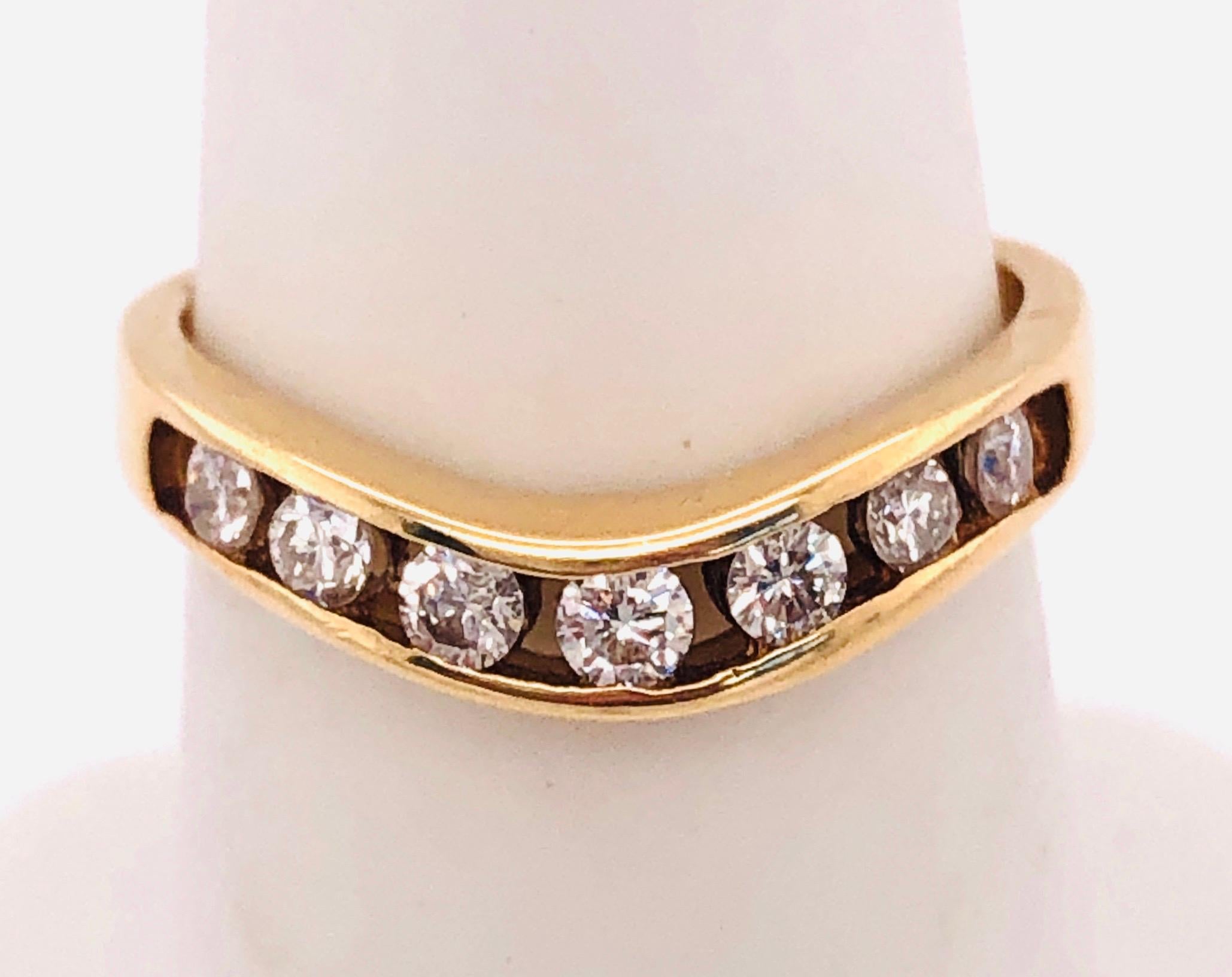 14Kt Yellow Gold Freestyle Ring Bridal Wedding Band 7 Diamonds 0.50 TDW
 Size 6
3 grams total weight.