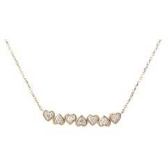 14KT Yellow Gold Graduated Seven Heart Diamond Necklace
