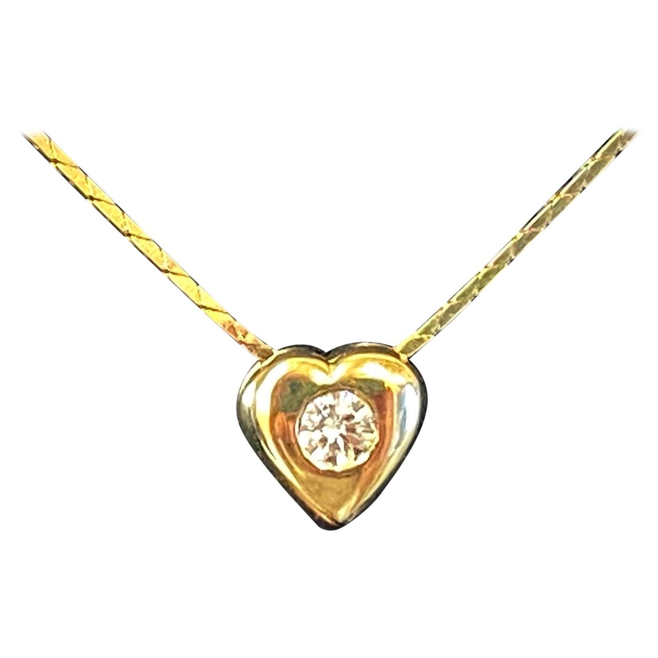 14kt Yellow Gold Heart Pendant with Diamond and Sapphire Center