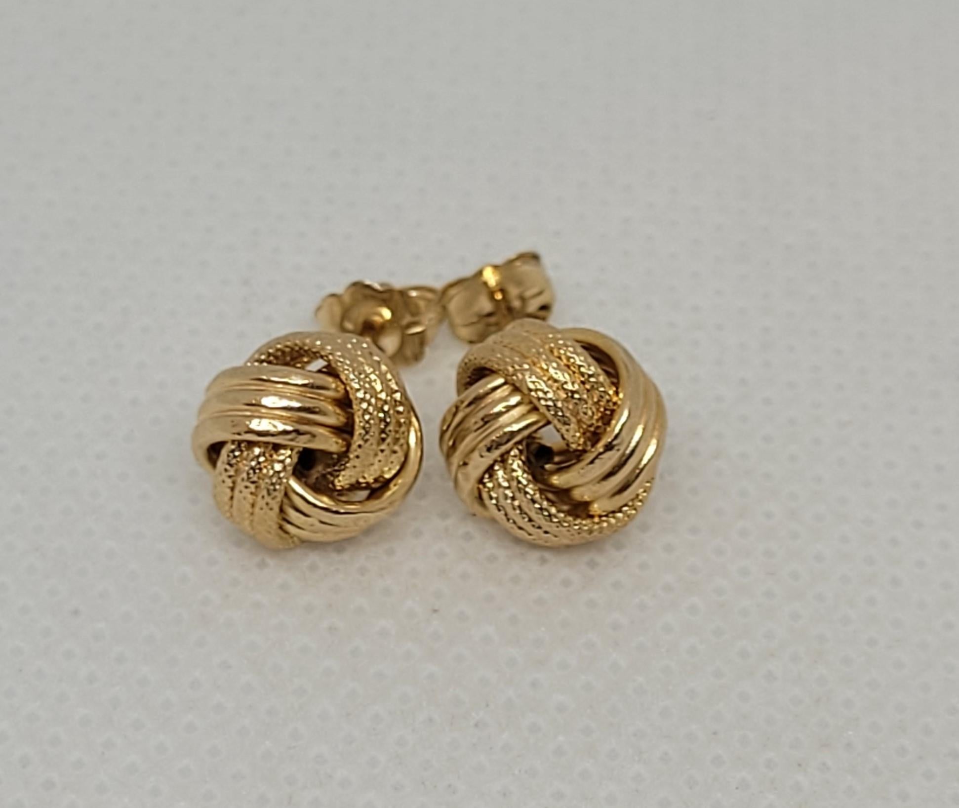 Lovely 14kt Yellow Gold Knot Earrings, Friction Post with Push-On Backings, .7 Grams hollow, Stamped 14kt Italy RL. These are great versatile earrings.  Overall, these earrings are in very good condition. Please let me know us to know if you have