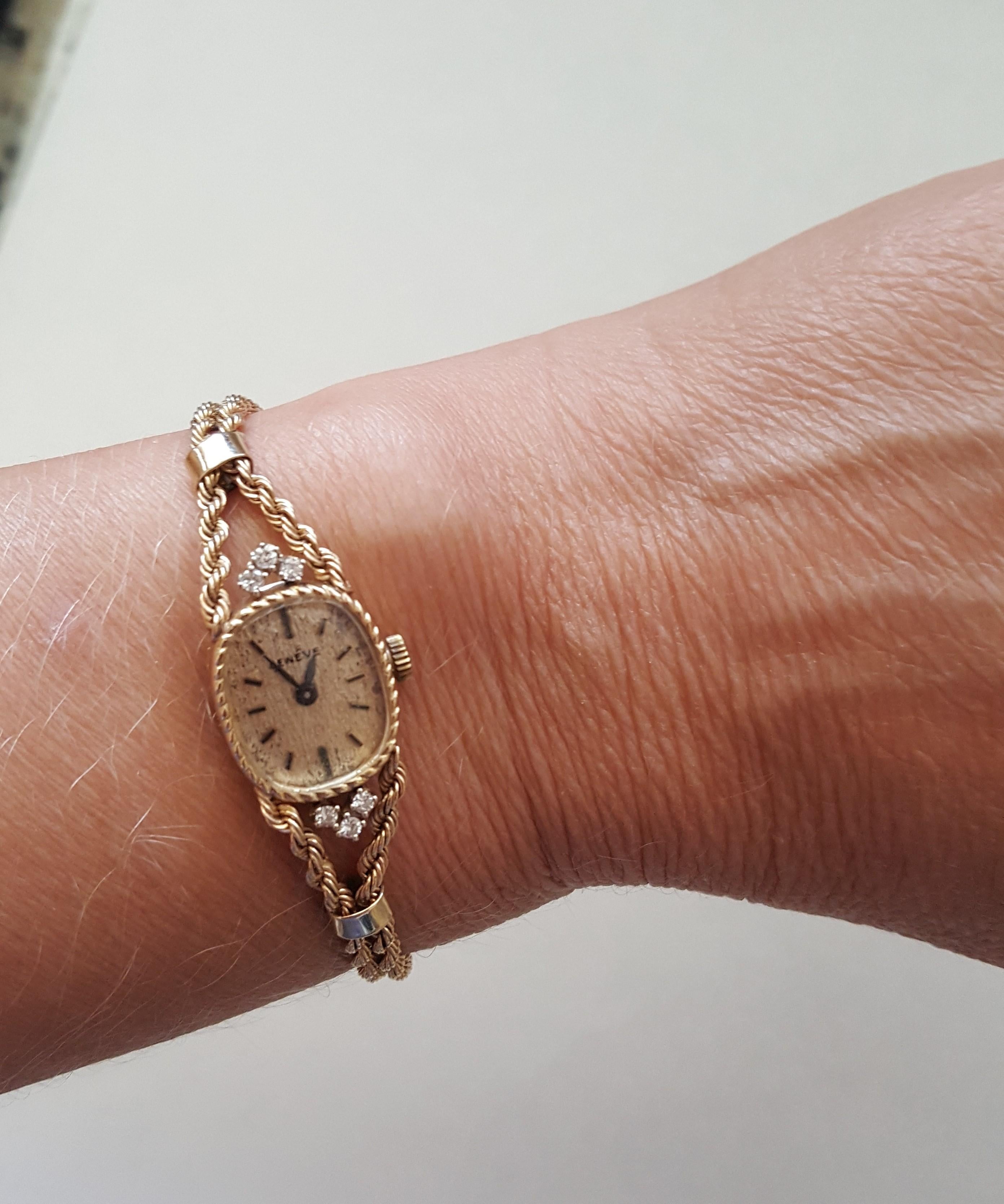 14kt Yellow Gold Ladies Geneve Watch, Rope Bracelet, 6 Diamonds of .15cttw, 10.8 gr. Vintage ladies watch in good, working condition. Case is 6.8mm x 15mm x 18 mm. The diamond weight is an approximation of .15cttw, G color and SI clarity.  The face