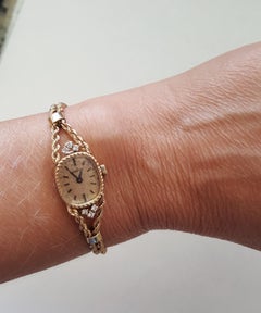 14kt Yellow Gold Ladies Geneve Watch, Rope, Working, 6 Diamonds .15cttw, 10.8 gr