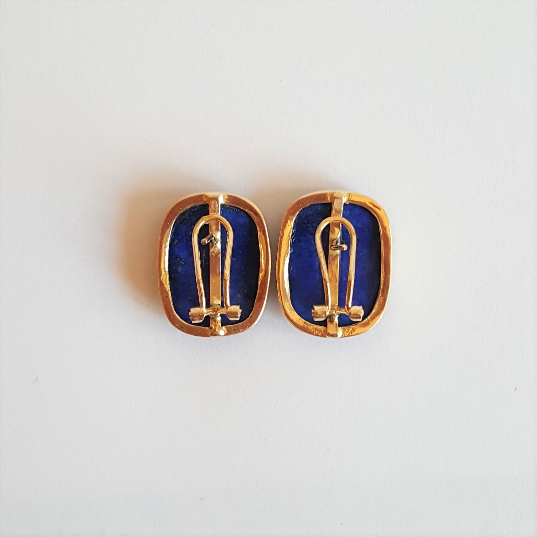 14kt Yellow Gold Lapis Lazuli Earrings, Beautiful Condition, 21mm x 16m Size, Friction Post with Omega Backing, Stamped 14kt, 8.7 grams

These earrings are in beautiful condition and well cared for; they appear to be hardly worn. 

Please let us