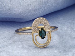 Anello ad arco geometrico in oro giallo 14KT con topazio blu di Londra e diamanti