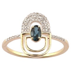 Anello ad arco geometrico in oro giallo 14KT con topazio blu di Londra e diamanti