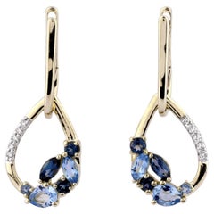 Ohrringe aus 14-karätigem Gelbgold mit mehrfarbigen blauen Topasen und Diamanten