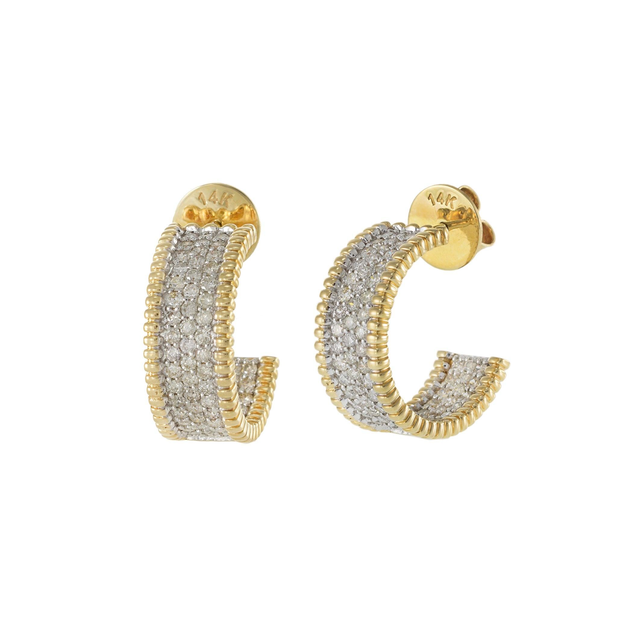 These exquisite open huggie earrings are crafted in 14KT yellow gold and feature 1.48 carats of round cut diamonds. The design is enhanced with gold beaded edges, adding a unique and stylish detail. Perfect for everyday wear or special occasions,