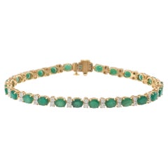 14KT Yellow Gold Oval Alternating Emerald 
Diamond Tennis Bracelet