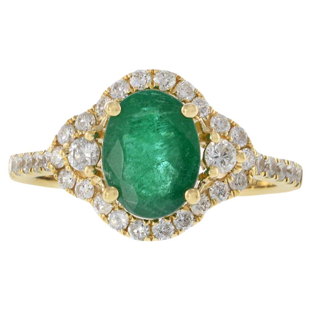 Anillo Halo de Esmeralda y Diamante en Oro Amarillo de 14 KT talla oval