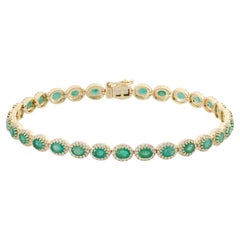 Bracelet de tennis en or jaune 14KT avec émeraudes et diamants de taille ovale