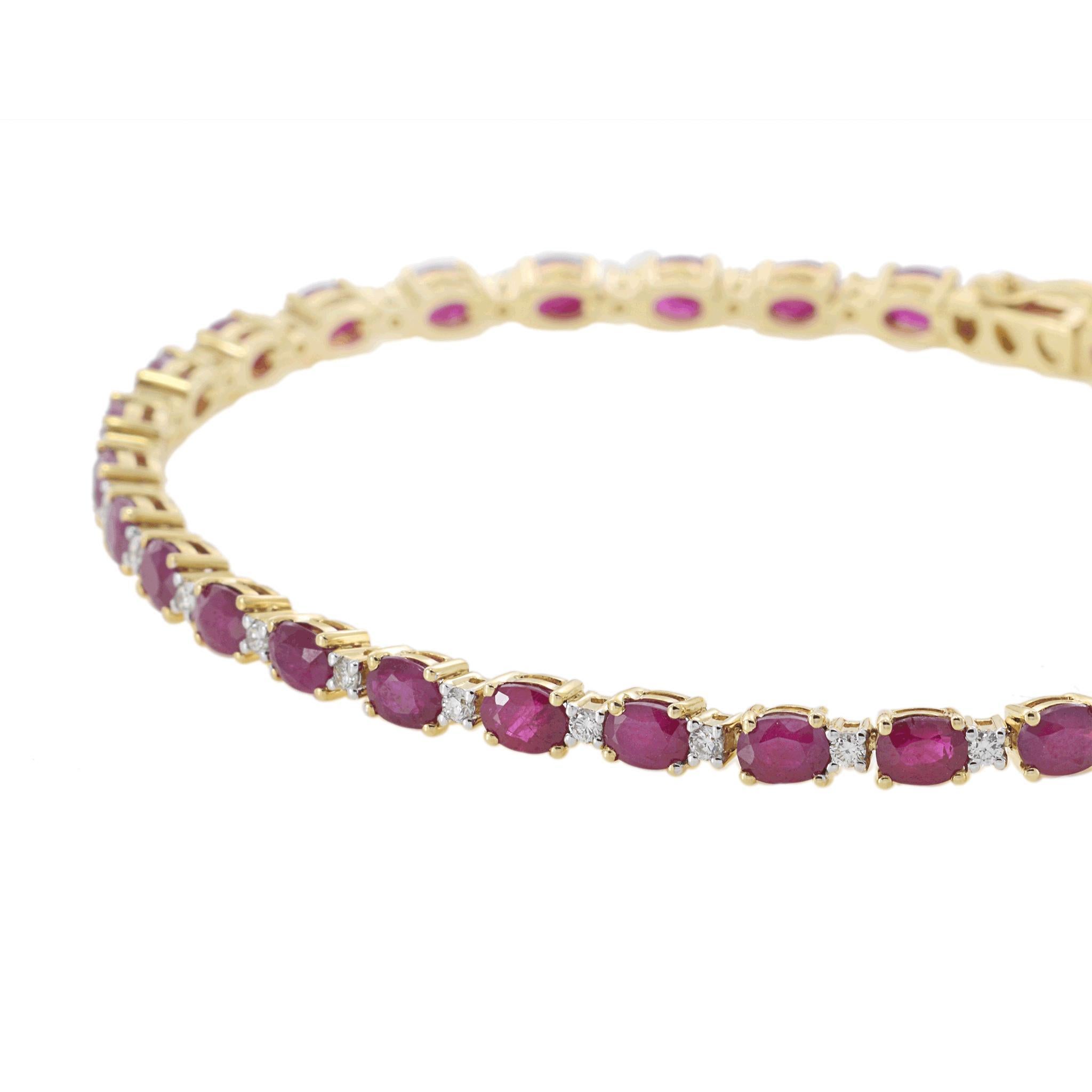 A beautifully crafted 14KT yellow gold bracelet, featuring 7.00CT-TW of vibrant oval-cut rubies, each securely set to showcase its rich color. Accentuating the rubies are 0.50CT-TW of round-cut diamonds (G-H/SI clarity), adding brilliance and