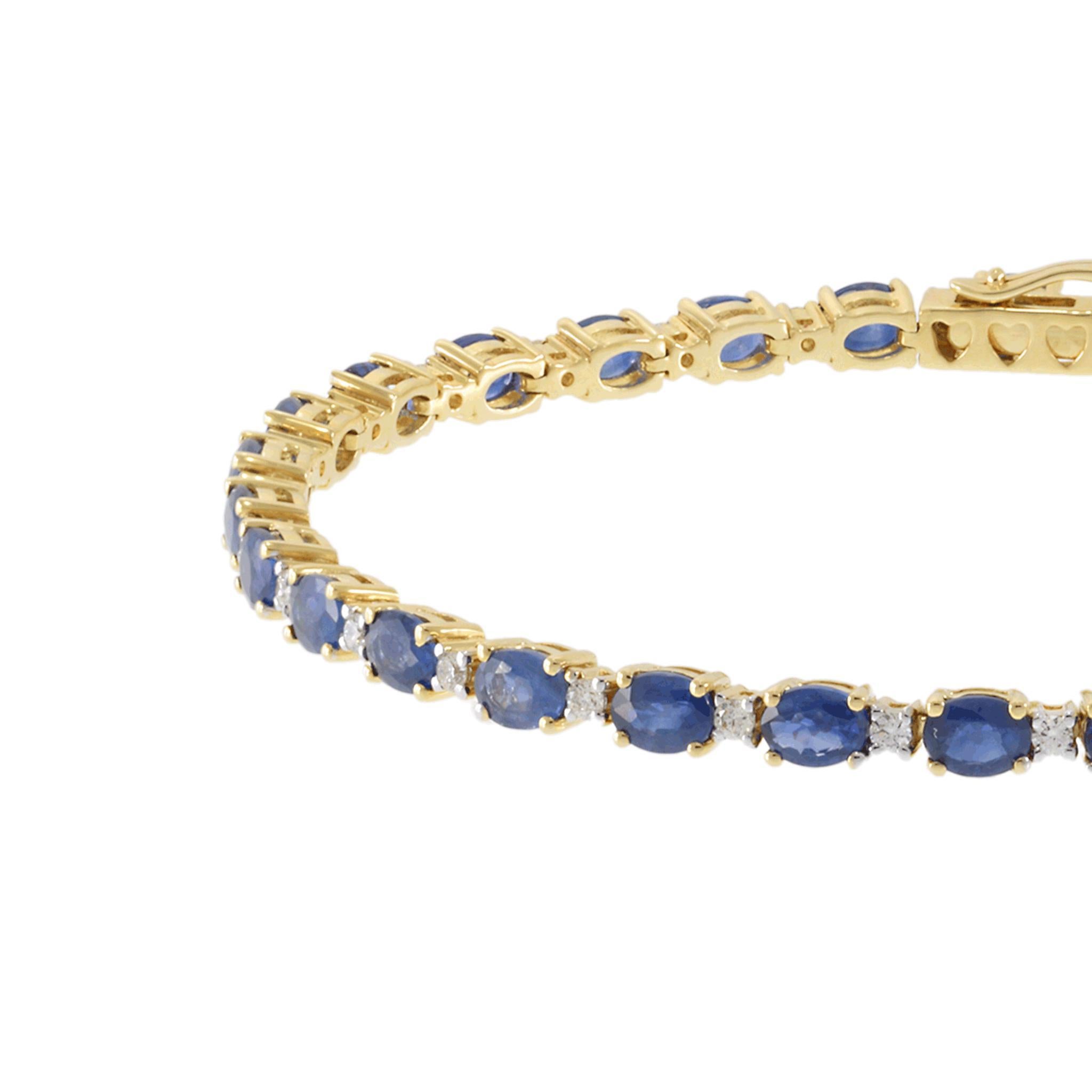 This 14KT yellow gold bracelet features 7.50CT-TW of deep blue oval-cut sapphires, elegantly set to highlight their rich color. Complementing the sapphires are 0.50CT-TW of round-cut diamonds (G-H/SI clarity), adding brilliance and contrast.