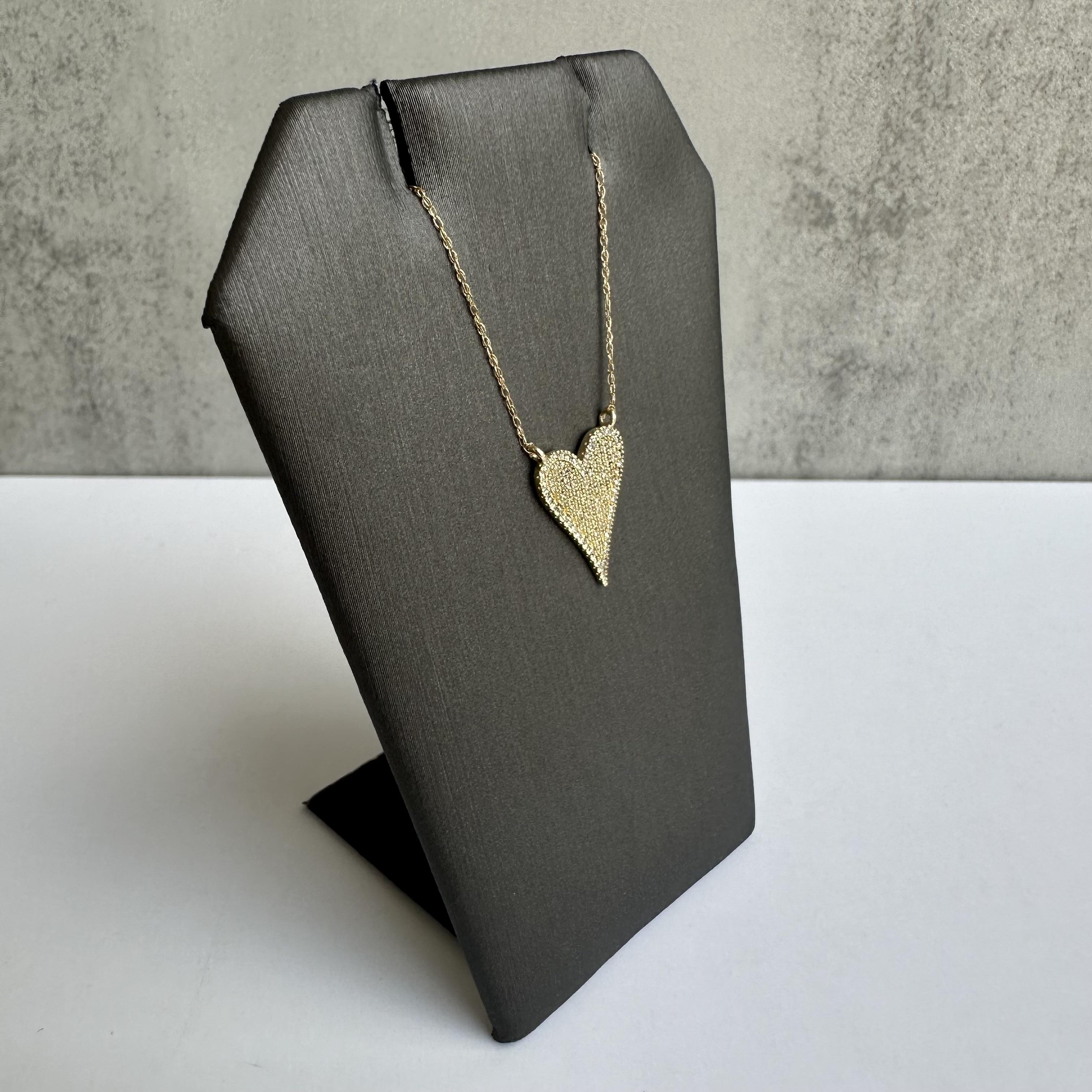 Enhance your jewelry collection with this exquisite 14kt Yellow Gold Pave Diamond Heart Necklace. Featuring 0.20 carats of GH SI natural single cut diamonds, this necklace combines timeless beauty with modern elegance, perfect for any