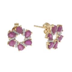 Orecchini a fiore aperto in oro giallo 14KT con rubino perlato e diamanti