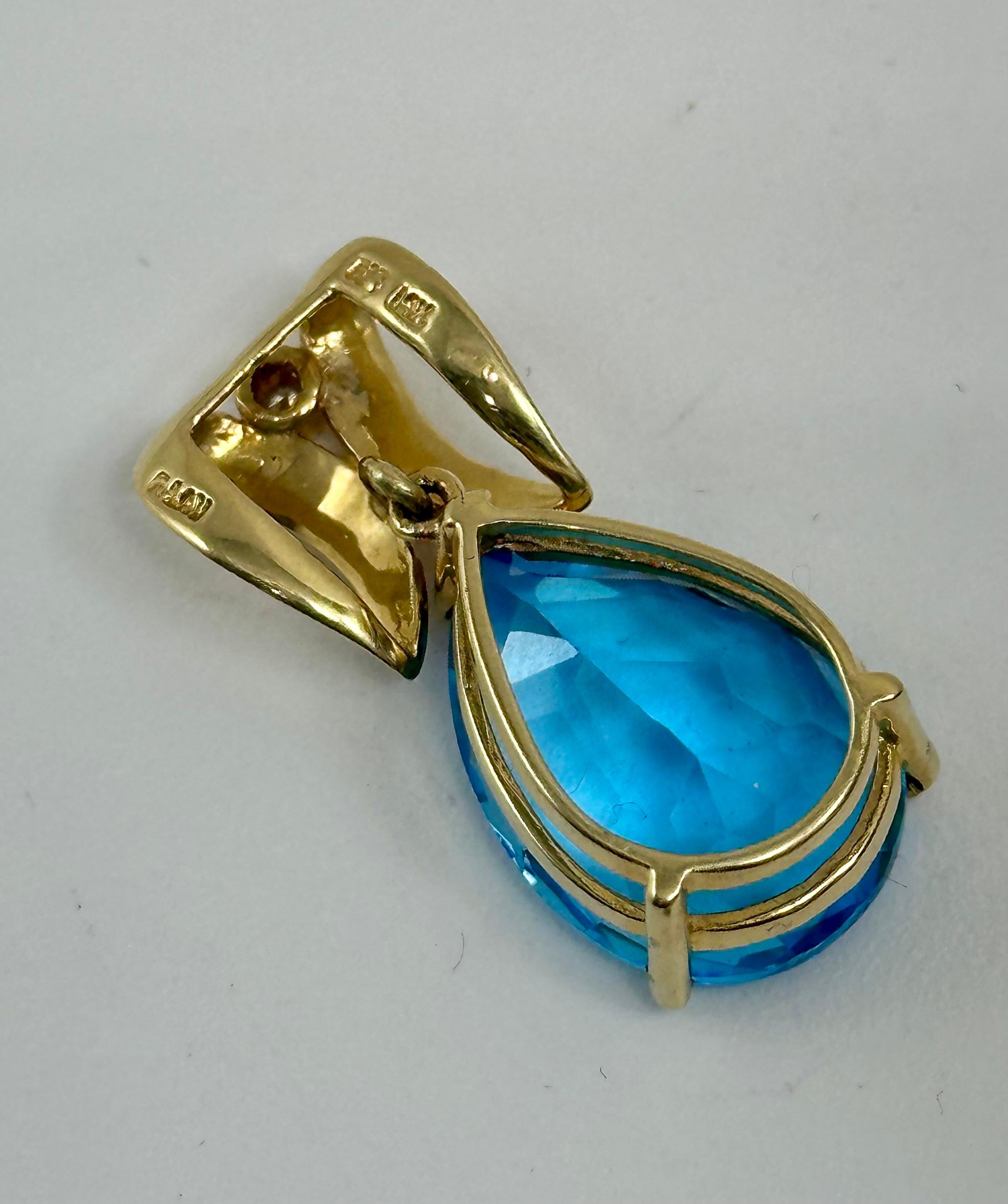 Women's 14kt Yellow Gold Pear Shape London Blue Topaz 2mm Diamond 1 1/4