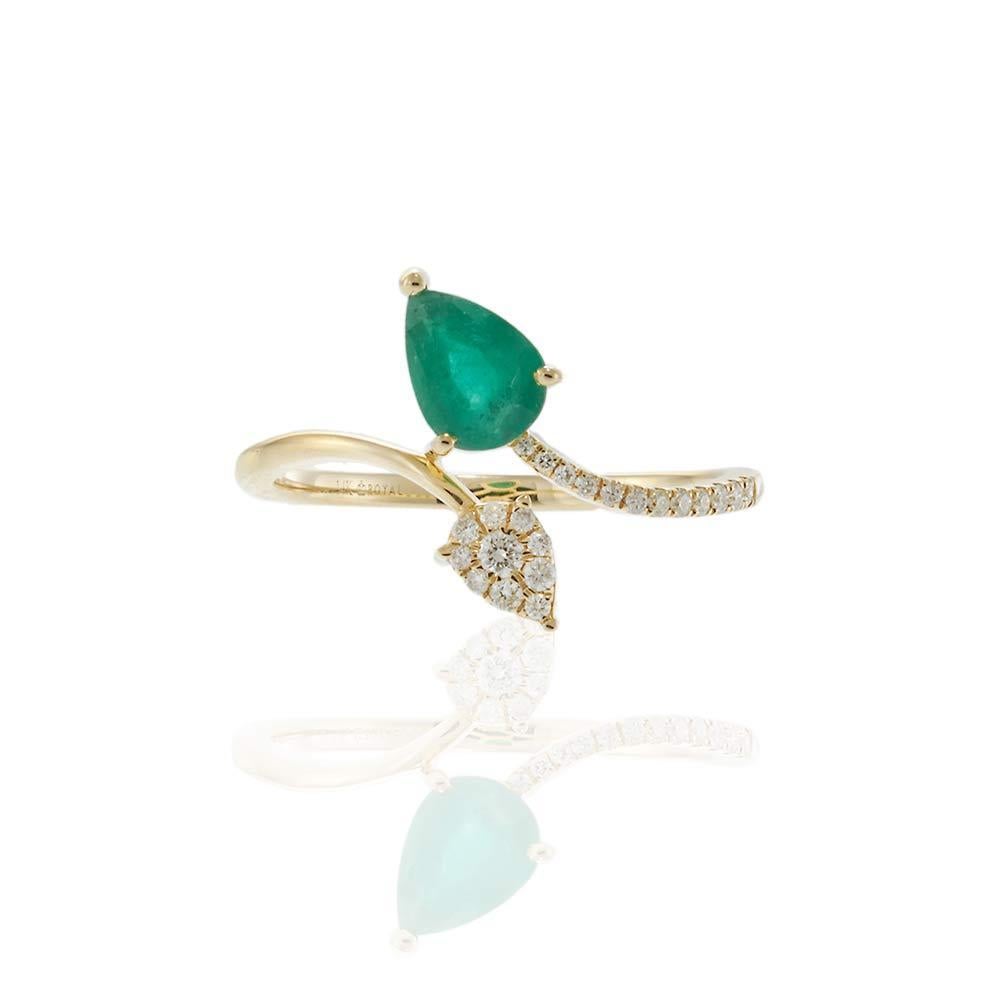 Delicately crafted in 14KT yellow gold, this stunning open petal-inspired ring features a pear-shaped emerald accented by a complementary pear-shaped diamond cluster. A sweeping curve of round brilliant cut diamonds adds sparkle to the band,