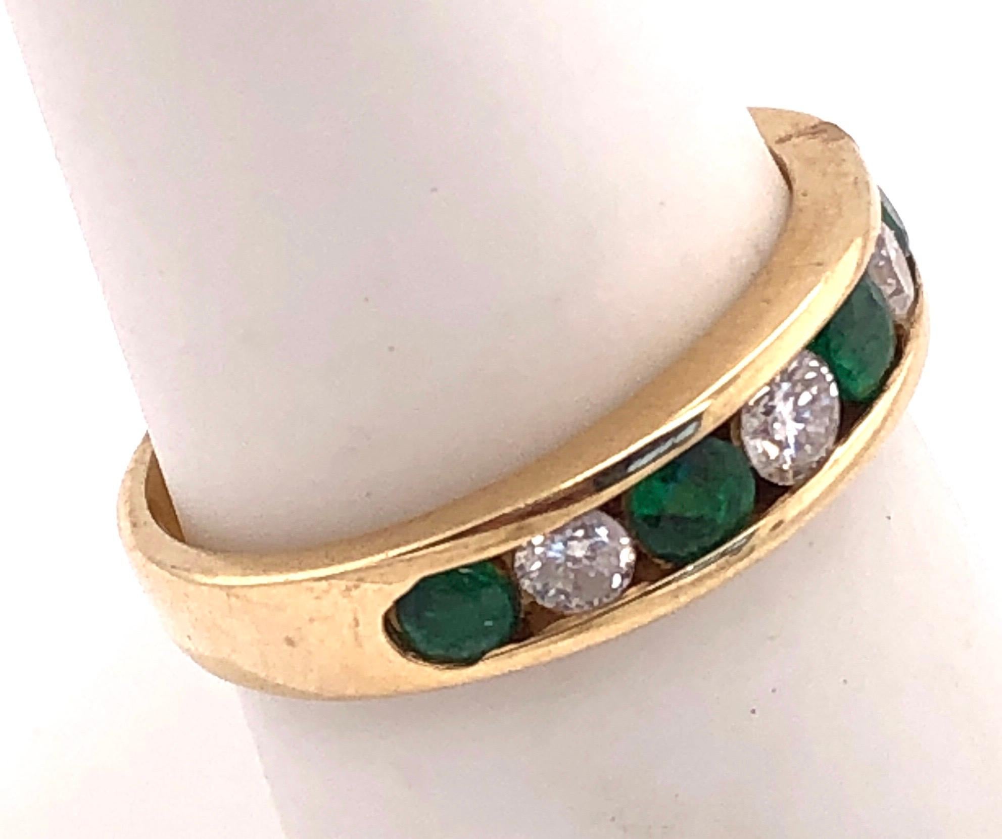 Round Cut 14 Karat Gold Ring or Wedding Band Seven-Stones Emerald and Diamond .36TDW For Sale