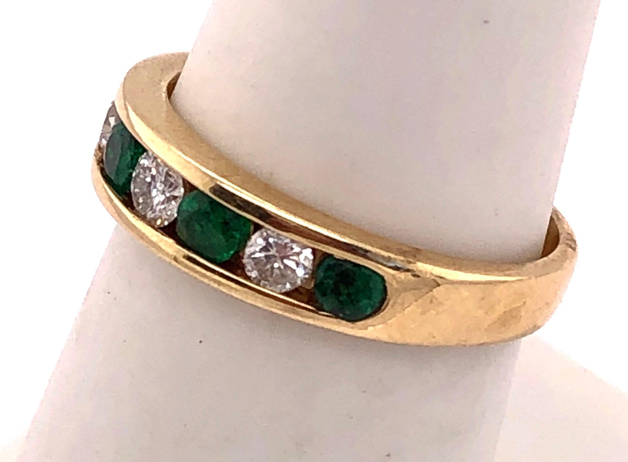 Women's or Men's 14 Karat Gold Ring or Wedding Band Seven-Stones Emerald and Diamond .36TDW For Sale