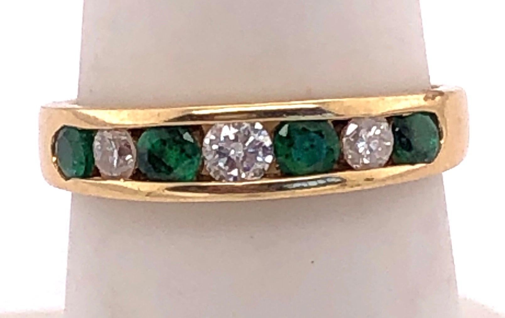 14 Karat Gold Ring or Wedding Band Seven-Stones Emerald and Diamond .36TDW For Sale 3