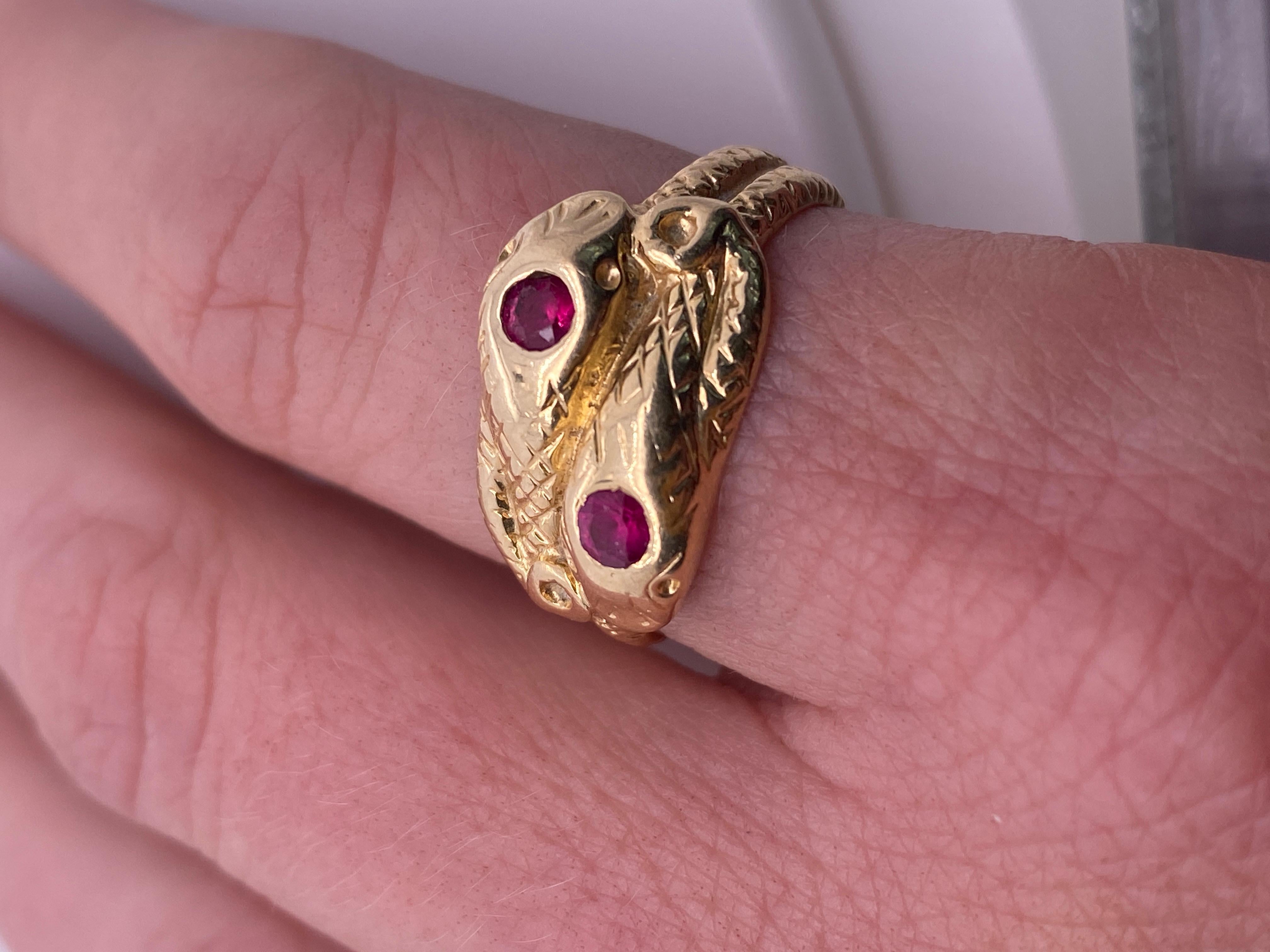 14kt Yellow Gold, Ruby Head, Textured Double Snake Ring, size 7 1/2. Features texture along top and sides. 