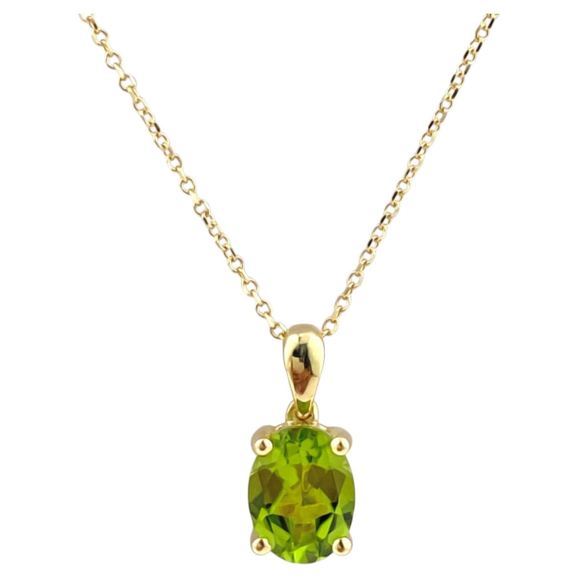 Collana con ciondolo solitario in oro giallo 14KT con peridoto taglio ovale