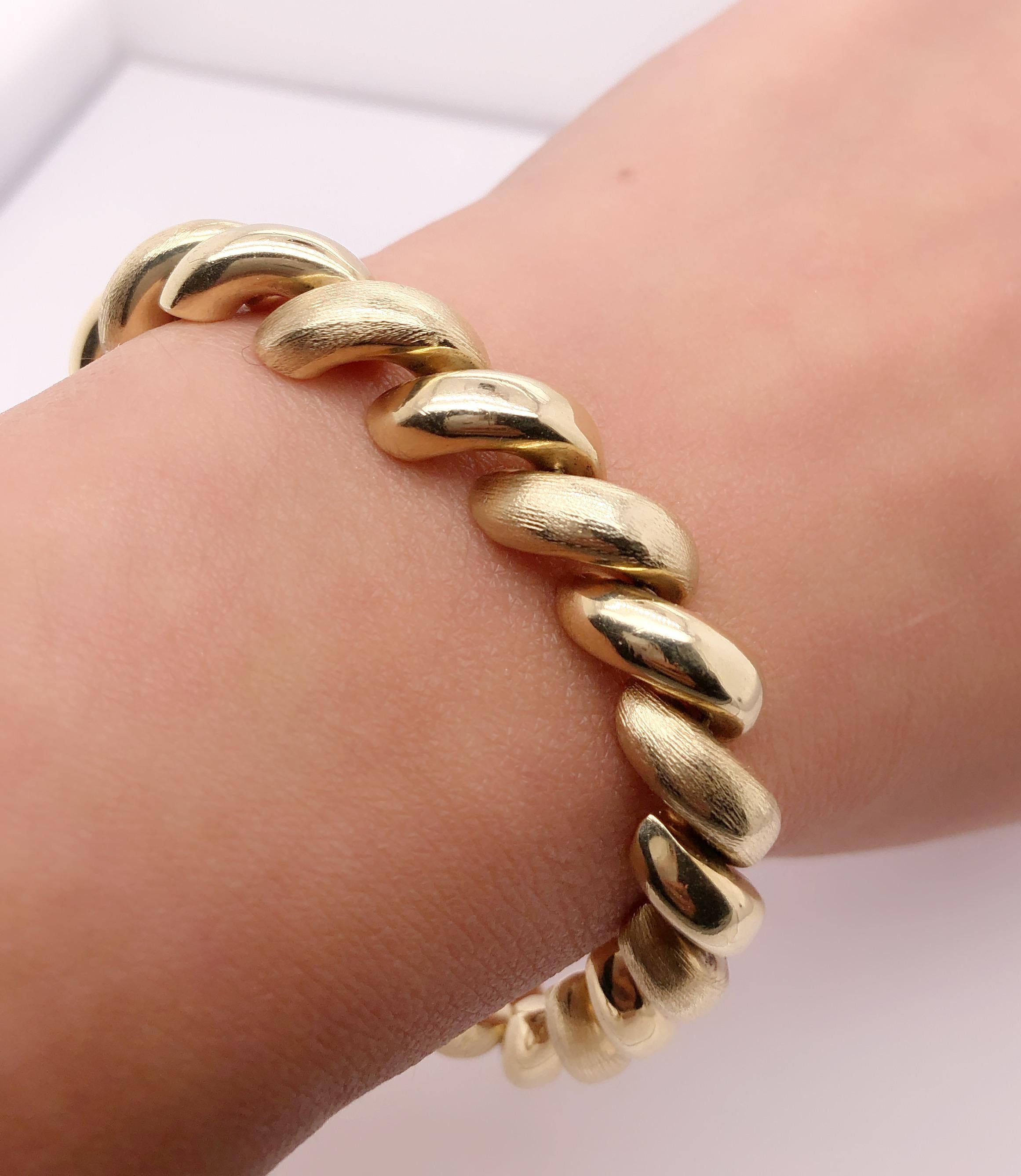 14Kt Yellow Gold Spiral San Marco Bracelet. 23 grams. 7.5 inches. Italian 9.66mm wide. 