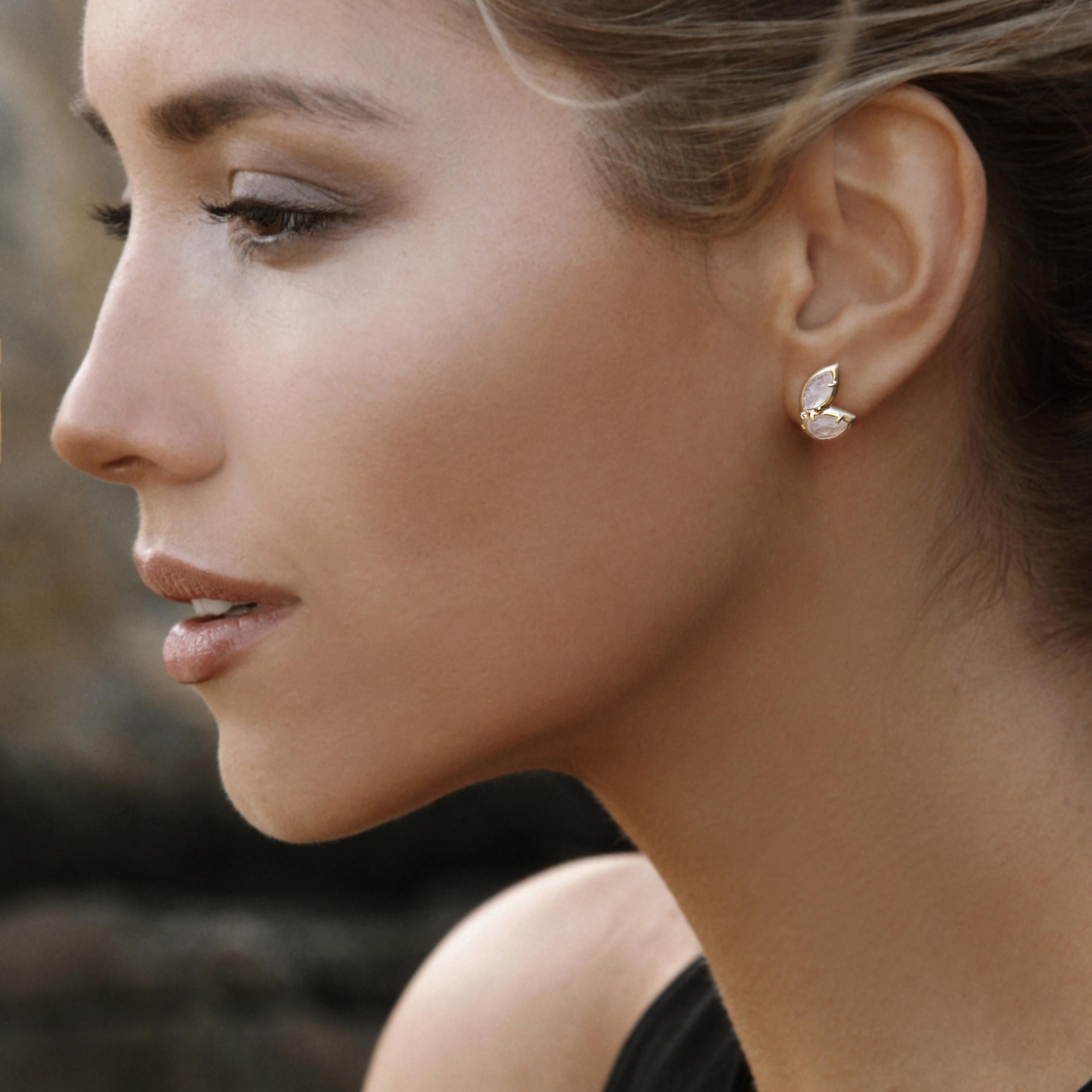 The Splay stud earring is both elegant and edgy. The creativity is yours as it can be worn in a multitude of ways. This Splay earring has marquise and pear shaped rose cut moonstones and diamond accents set in 14kt yellow gold.

14kt yellow