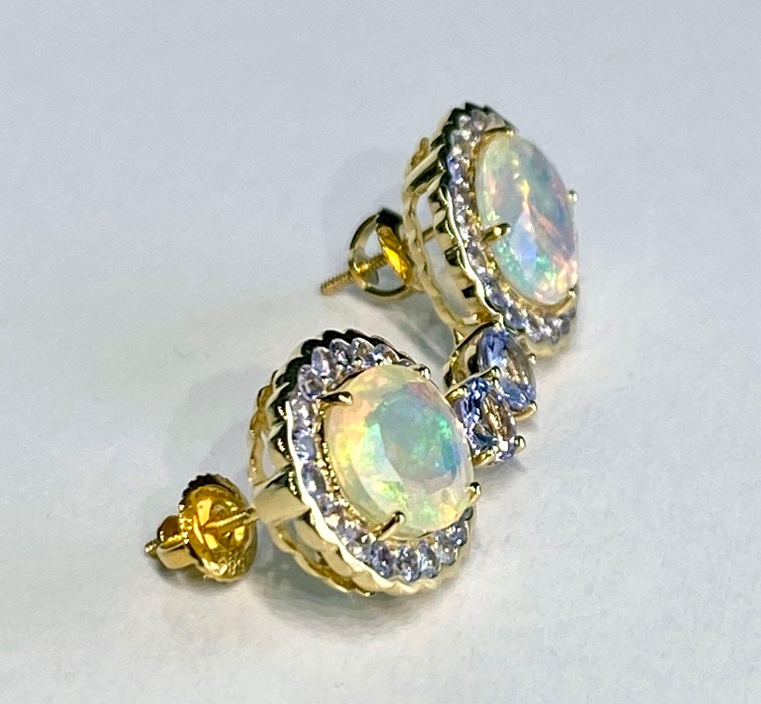 Oval Cut 14 Karat Yellow Gold Tanzanite & Opal Earrings For Sale