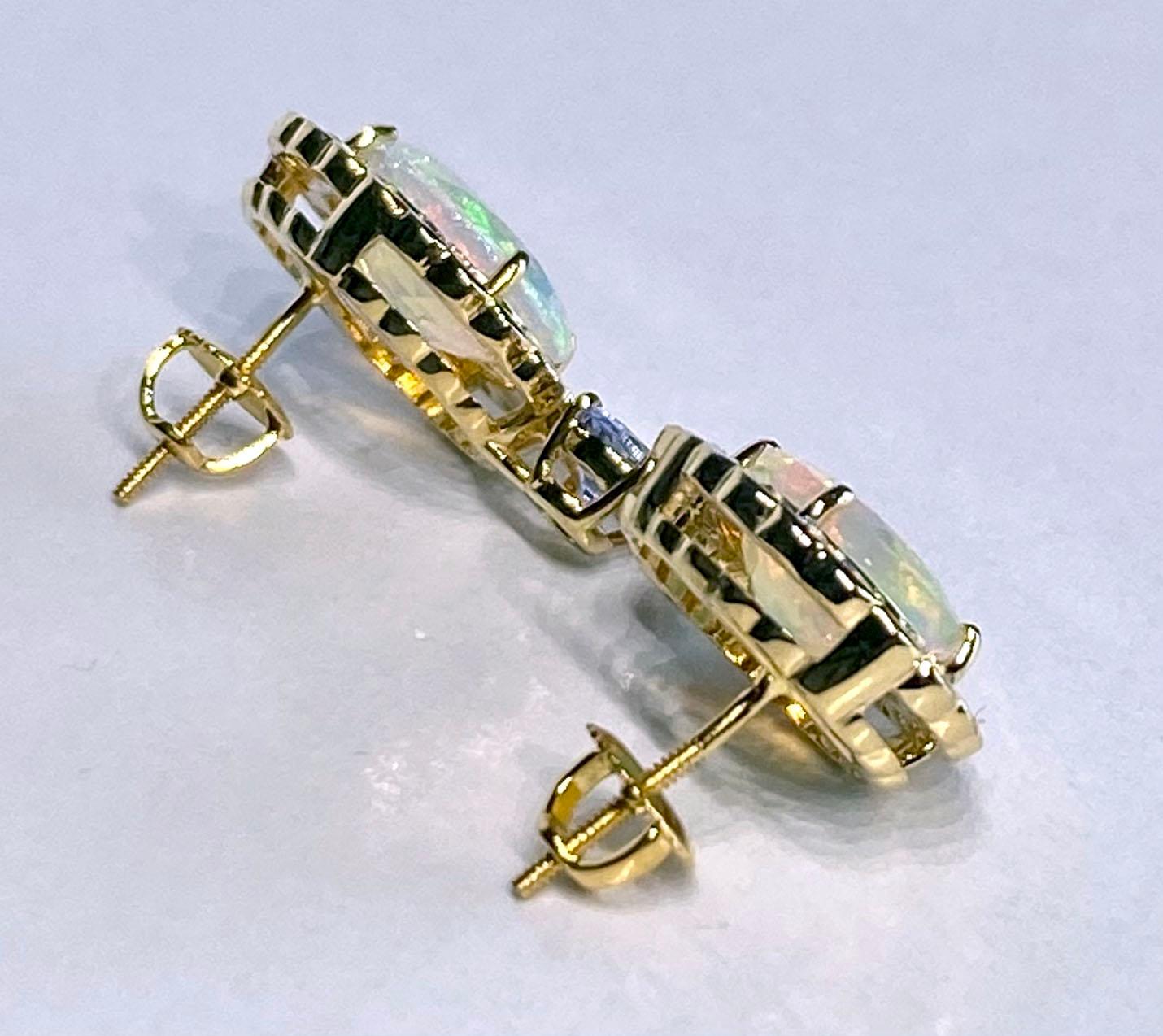 14 Karat Yellow Gold Tanzanite & Opal Earrings In New Condition For Sale In Seattle, WA