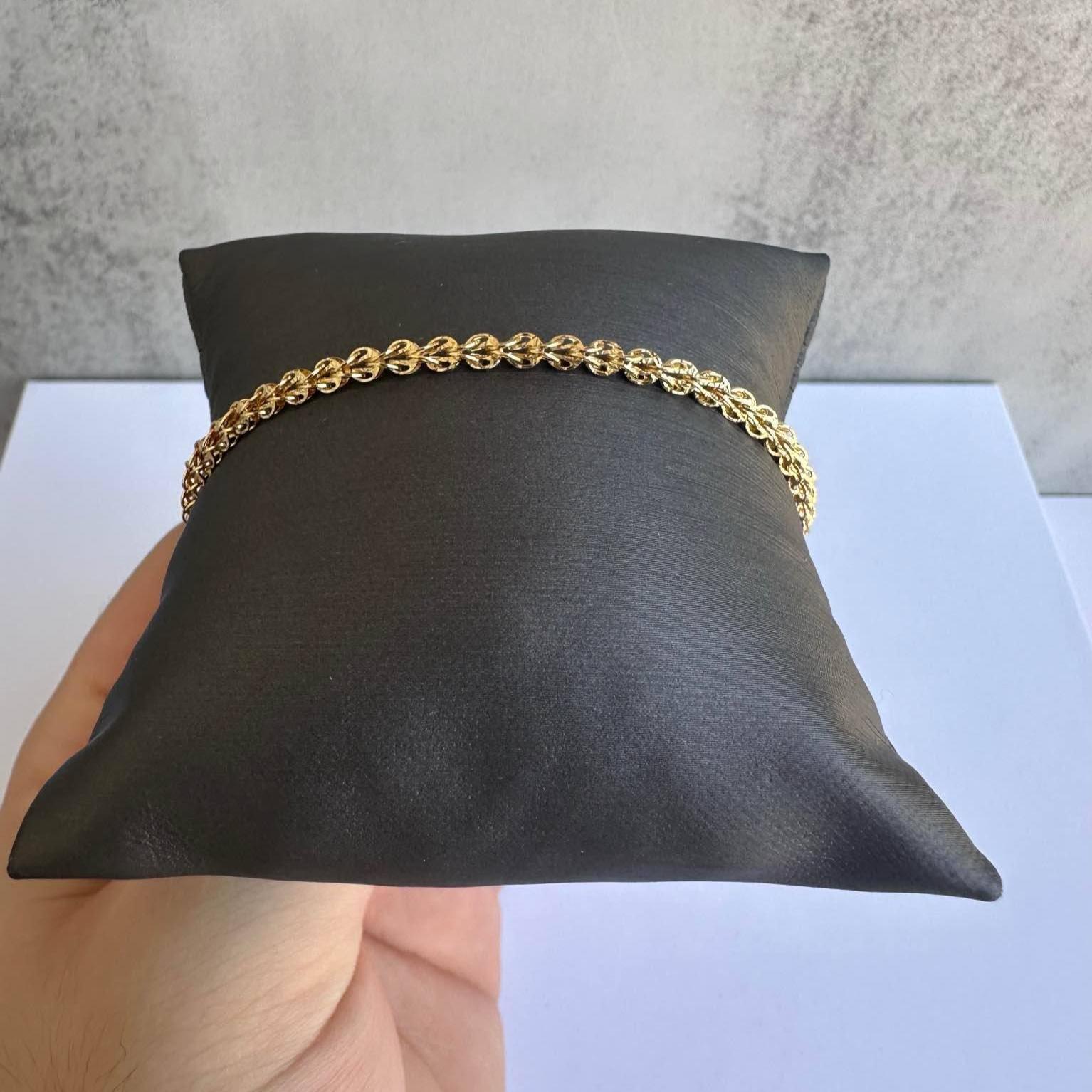 Add a touch of elegance to your jewelry collection with this 14kt Yellow Gold Turkish Link Bracelet. Crafted in Italy, this bracelet features a unique Turkish link design that is both stylish and versatile. Measuring 7.5 inches in length and 3mm in