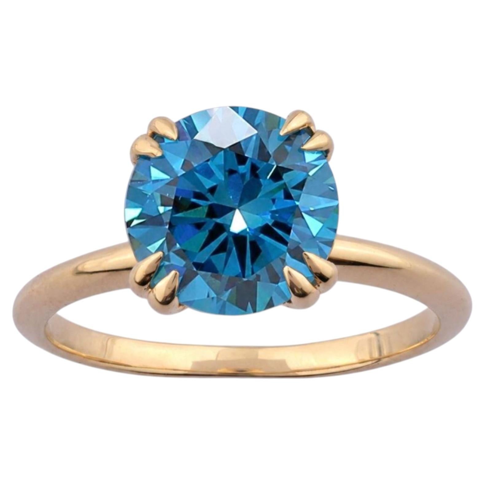 14KT Yellow Gold Vibrant Round Swiss Blue Topaz Solitaire Ring