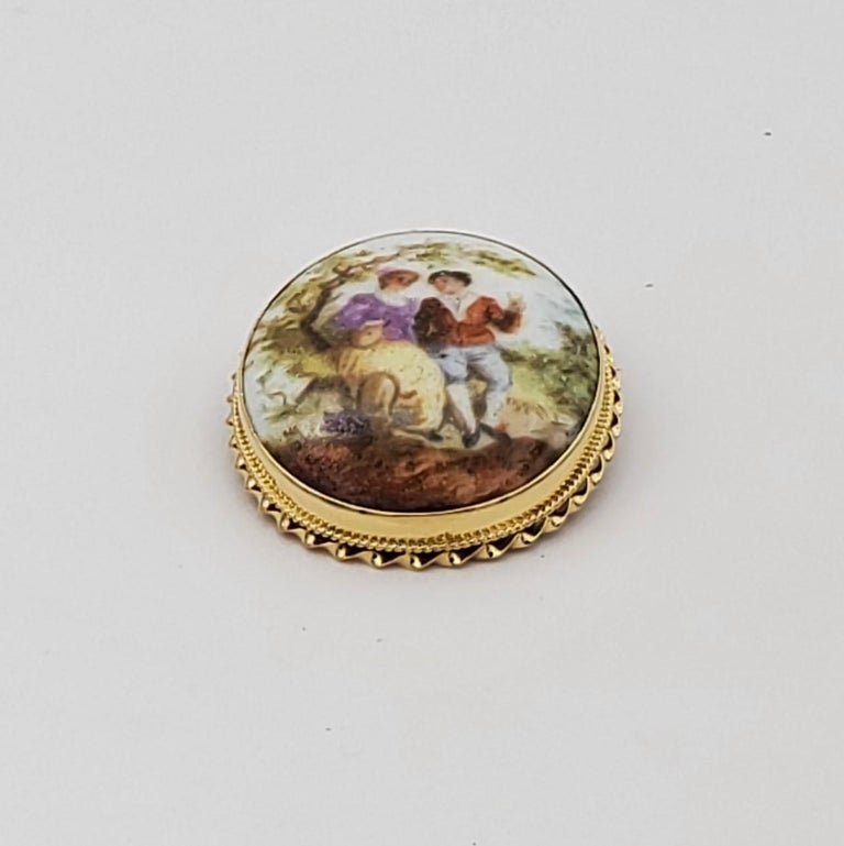 14kt Yellow Gold Vintage Brooch / Pendant, Courting Couple, Victorian, Early 1900, Good Condition, 39mm x 31 mm Oval, 11.1 grams, Stamp 14kt

Beautiful colorful romantic courting couple motif that was popular in the Victorian era. Minimal wear but