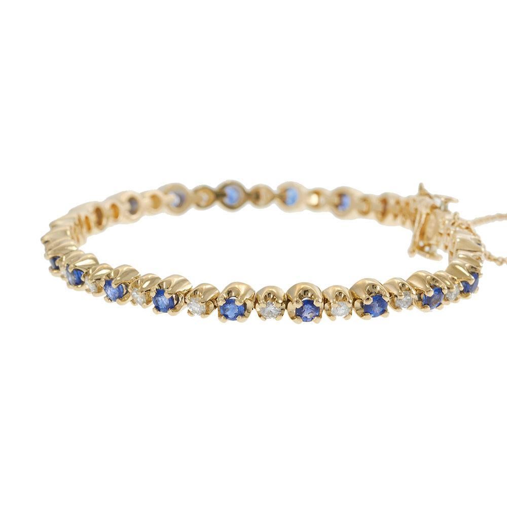 14KT Yellow Gold Vintage Sapphire and Diamond Tennis Bracelet Bon état - En vente à New York, NY