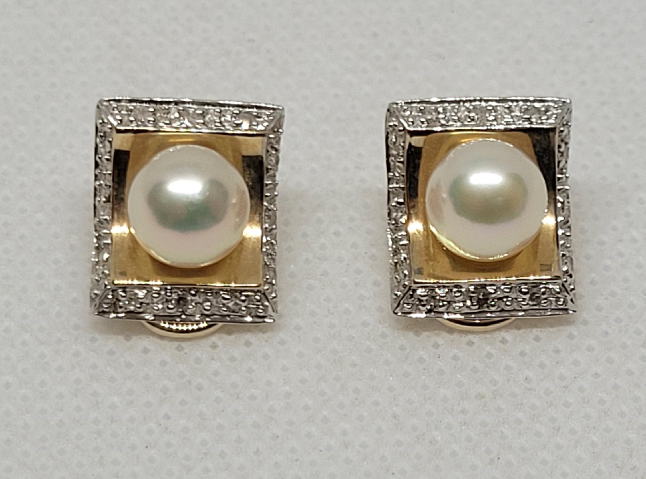 These exquisite earrings are crafted from 14kt yellow gold and feature two stunning 7 mm pinkish-white pearls that radiate elegance. Surrounding the pearls are 24 single-cut diamonds totaling approximately 0.20 carats, adding a touch of sparkle and