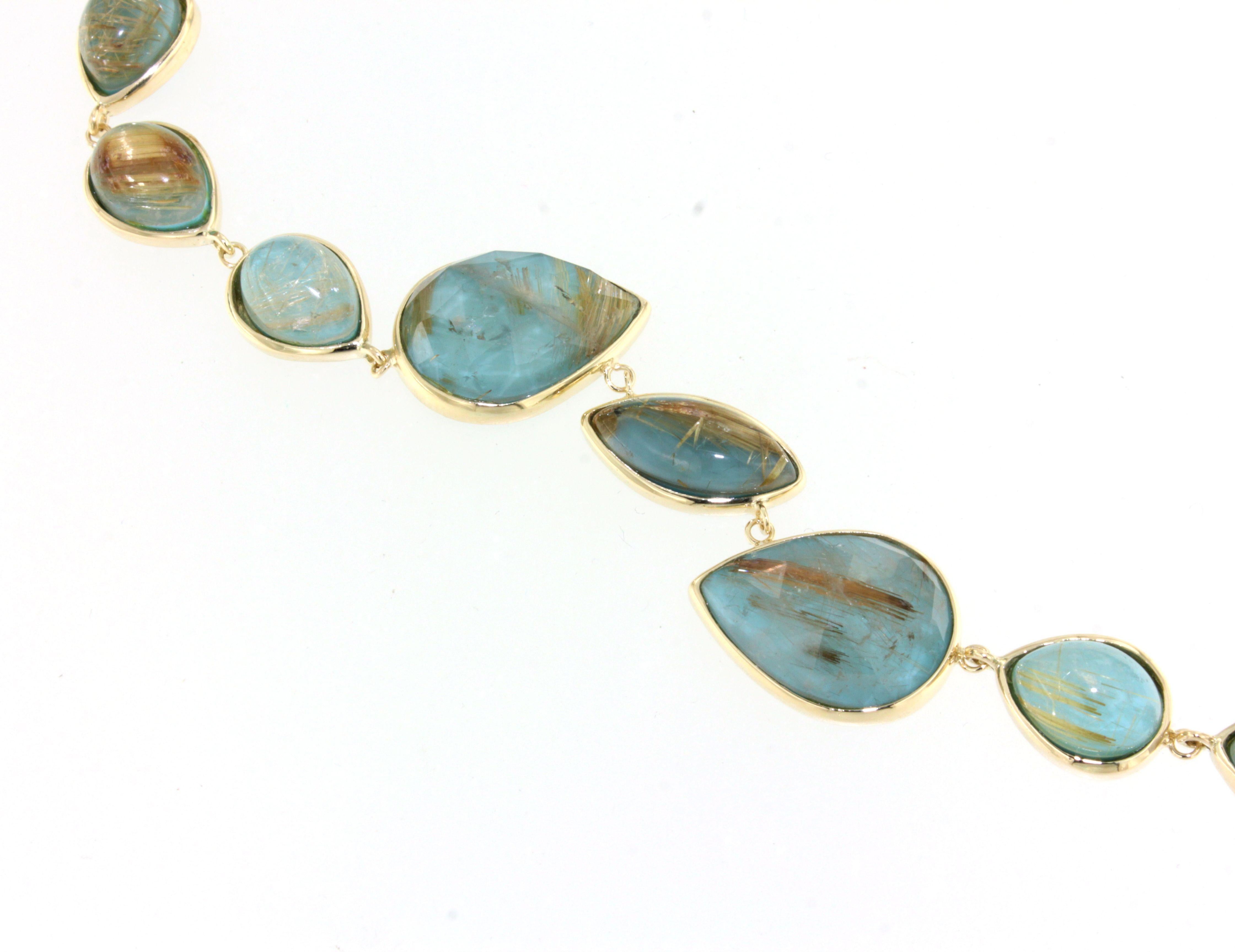 Fashion modern cocktail bracelet in 9kt rose gold with natural  double stone : rutilated quartz and tourquoise  handemade in Italy by Stanoppi Jewellery since 1948.  The stone is a real novelty, designed by the stylist Gisella for her new jewels of