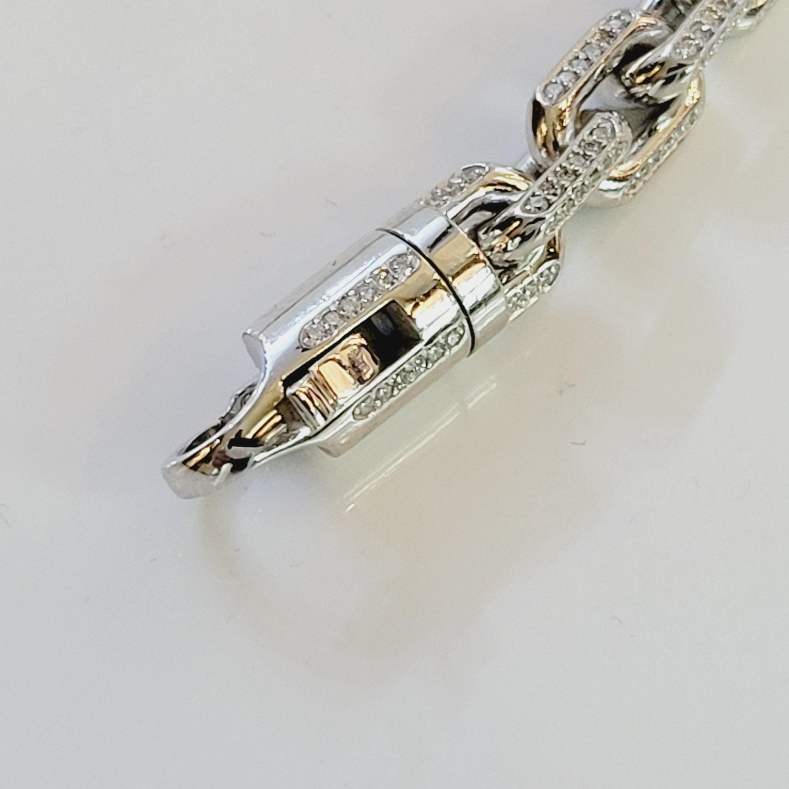 14-karat white gold
Pavé diamonds, 5.77 total carat weight
Bracelet, 8.00mm
Diamonds VS G 490pc
Push clasp
Chain links are engineered to be removable for resizing.