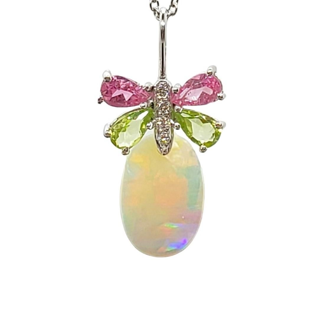 Uplifting combination of gemstone colors of Pink Tourmaline, Peridot, diamonds and Australian Opal. The Butterfly Necklace is in 14K white gold.
Only using high quality gemstones, diamonds, craftsmanship and gold, Alison creates one of a kind