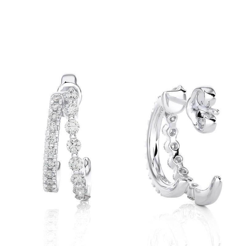 Moderne zweireihige, geteilte Diamant-Ohrringe mit Umarmung.

Diese betörenden Natural Earth-Mined Diamond Huggie-Ohrringe präsentieren zwei Reihen schimmernder Diamanten in einer klassischen 4-Zacken-Fassung mit einem Gesamtkaratgewicht von 0,38