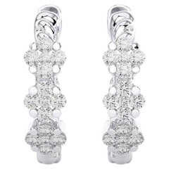 Or 14 carats - Trois fleurs  Boucles d'oreilles Huggie en diamant (0,21 carat).
