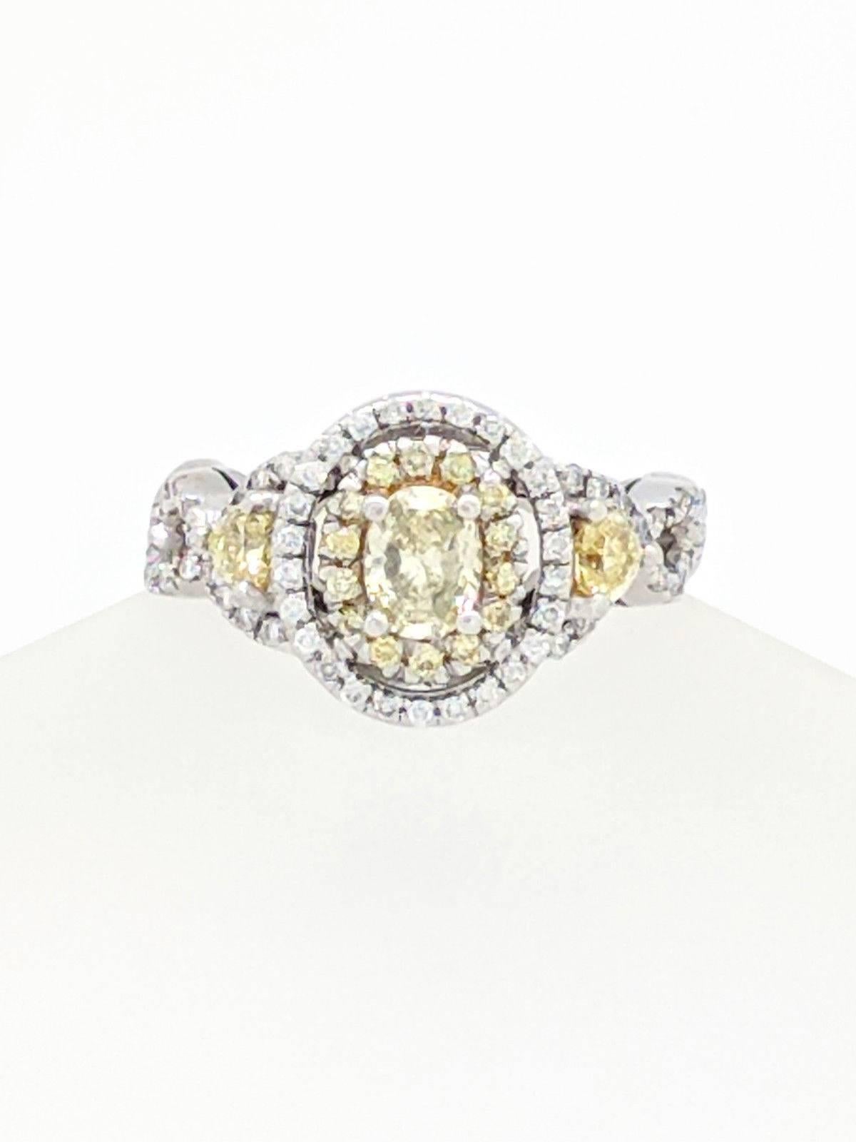 Oval Cut 14 Karat Fancy Yellow and White Diamond Engagement Ring 1.50 Carat