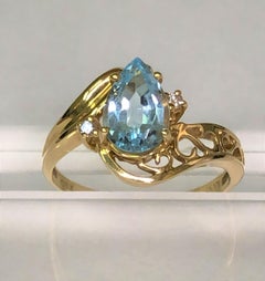 14KY Blue Topaz Diamond Ring
