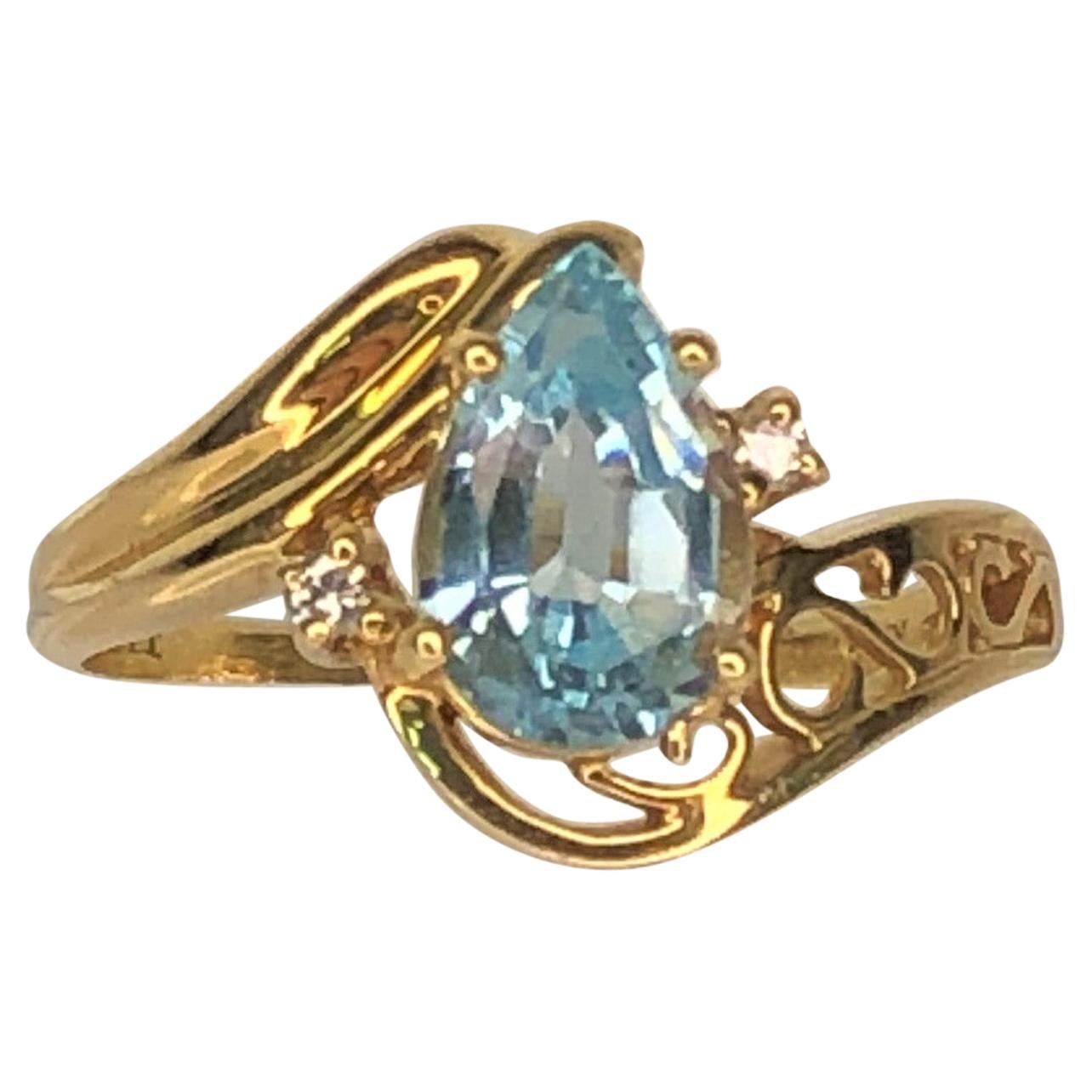 14KY Blue Topaz Diamond Ring