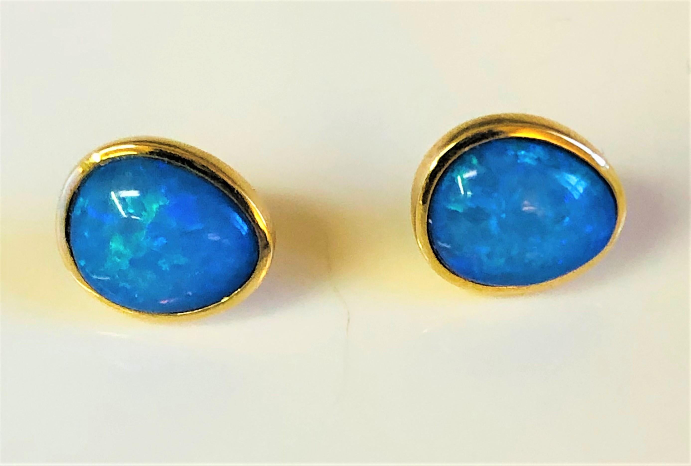 These natural blue opals are gorgeous and will be a favorite!
14 karat yellow gold tear drop shape, bezel set.
Natural blue stone with beautiful fleck.
Approximately 13 mm X 11mm.
Stamped 