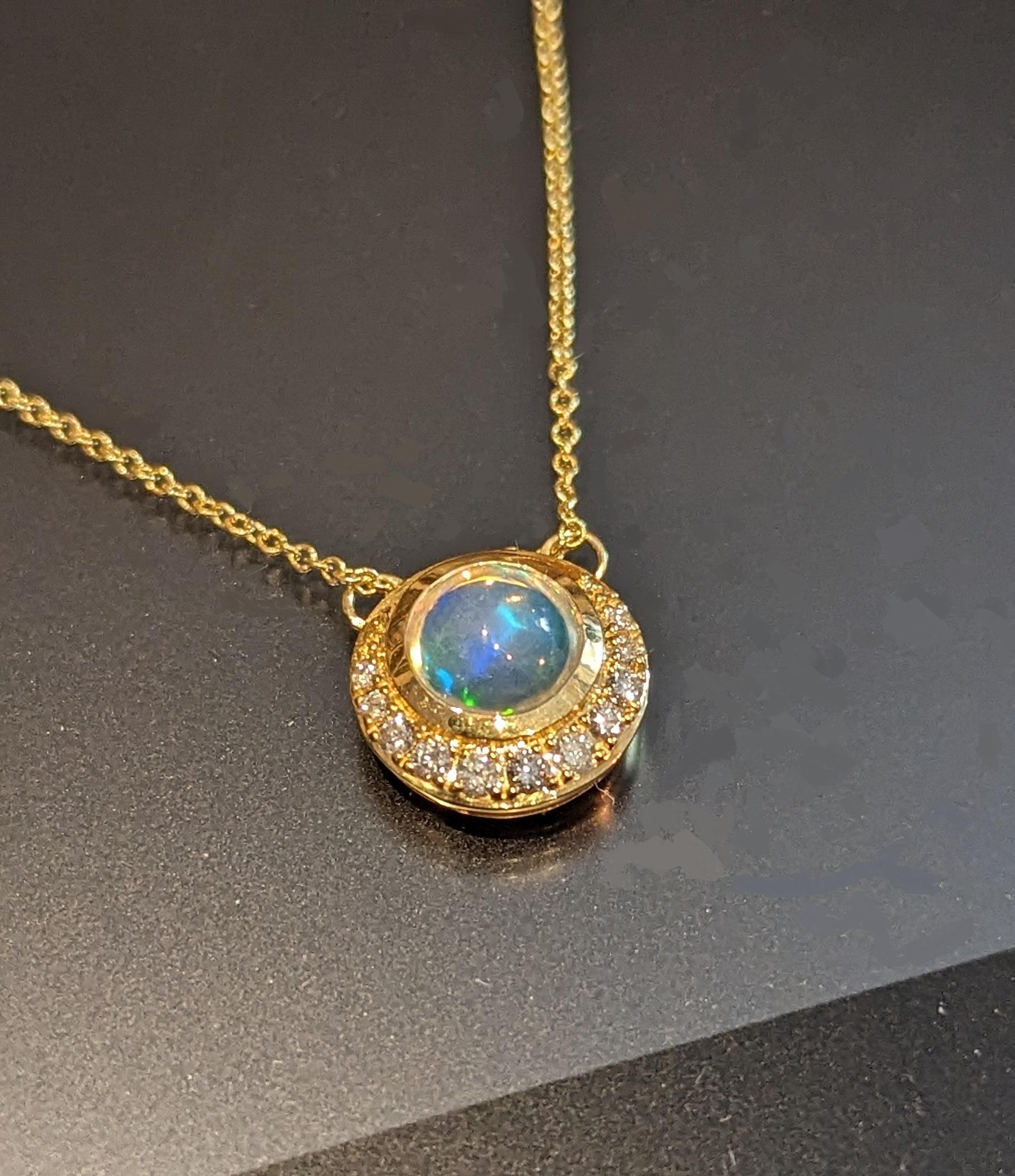 Contemporary 14ky Pendant necklace with Ethiopian Opal and Diamonds For Sale