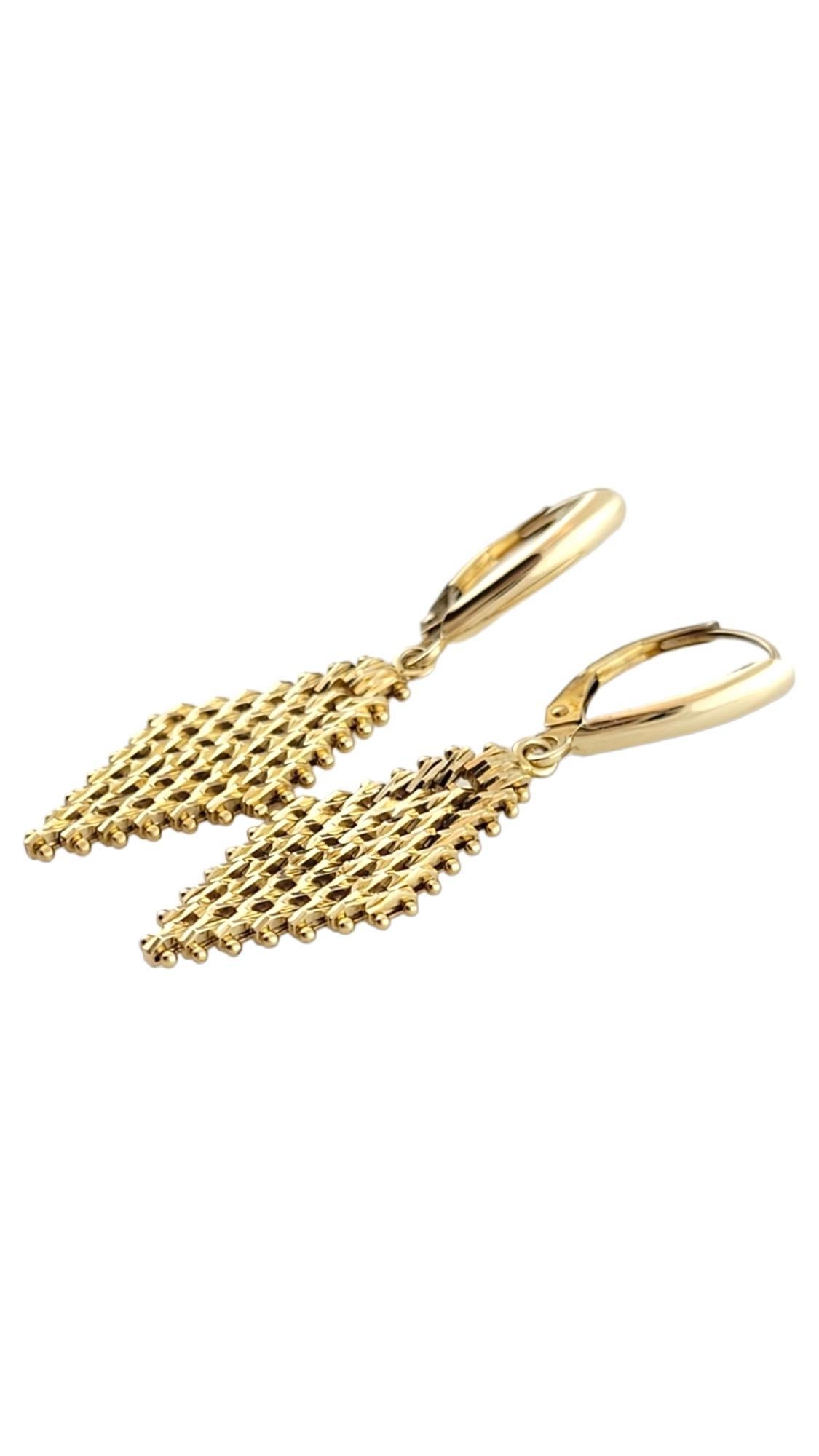 Vintage 14K Yellow Gold Kite Shaped Mesh Dangle Earrings

This gorgeous set of mesh dangle earrings are crafted from 14K yellow gold for a beautiful finish!

Size: 41.55mm X 11.25mm X 1.55mm

Weight: 3.9 g/ 2.5 dwt

Hallmark: 14K IG MEXICO

Very