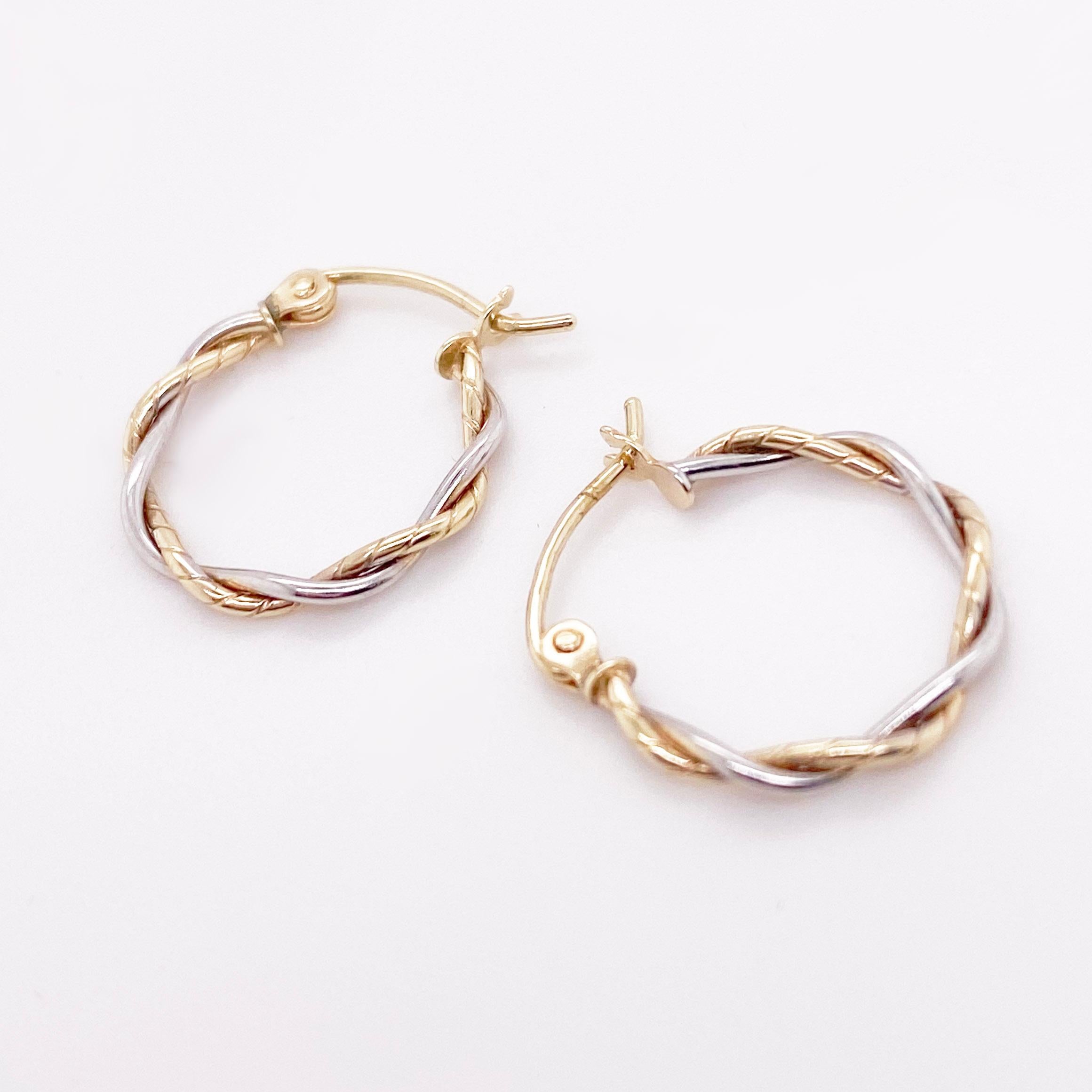 Gold hoop earrings are a staple in fine jewelry! These classic earrings are timeless and upgrade any outfit! The 14 karat yellow gold and white gold hoops are lightweight and comfortable to wear. They have a high polish finish mixed with a twisted